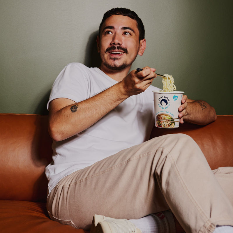 Kelly Loves Seafood Ramen Noodles eaten by a model