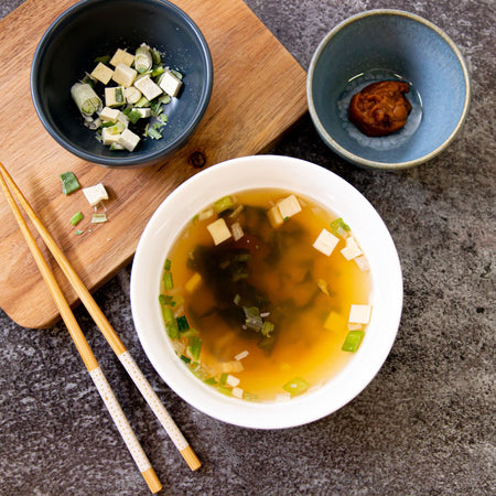 Kelly Loves Tofu Miso Soup in bowl with chopsticks