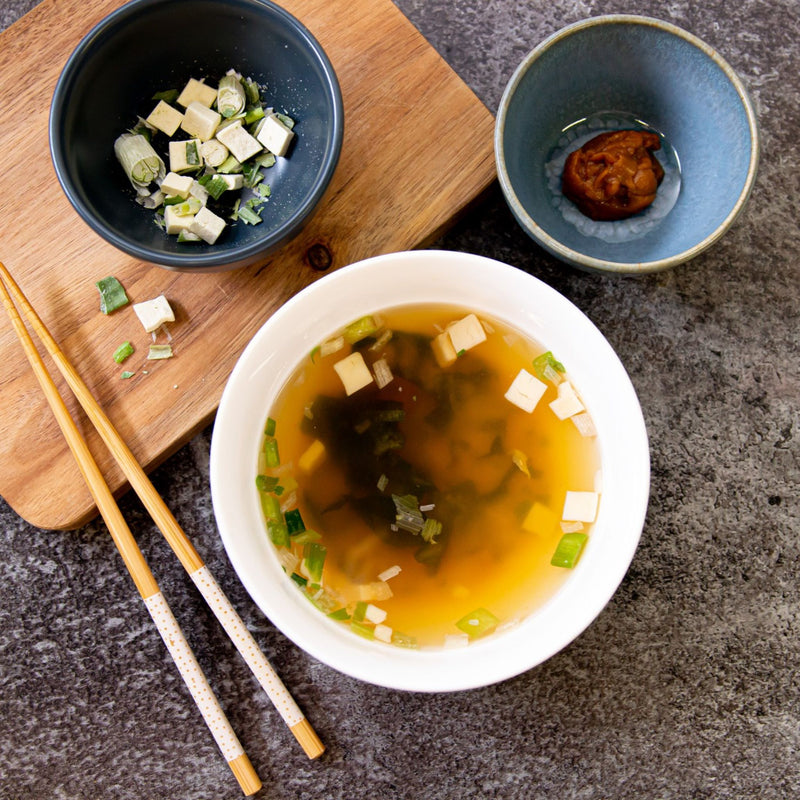 Kelly Loves Tofu Miso Soup in bowl with chopsticks